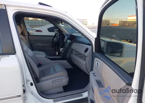 2011 Honda Pilot Touring z USA, uszkodzony, nr VIN 5FNYF3H99BB052009